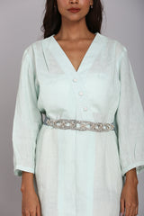 Blue tunic with buttons on neckline